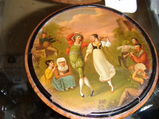 Early 19C burr walnut and tortoiseshell circular snuff box, painted with carousing peasants (damage)